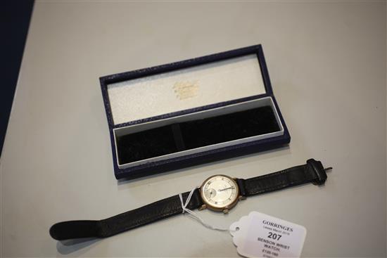 A gentlemans 1950s 9ct gold J.W. Benson manual wind wrist watch,